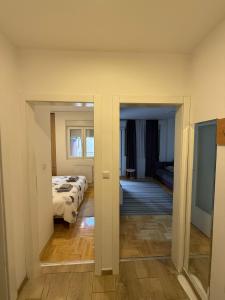 Postel nebo postele na pokoji v ubytování Apartman Filip