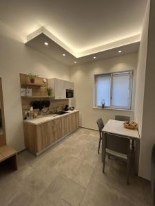 Kuchyň nebo kuchyňský kout v ubytování Borgo di Levante luxury apartments