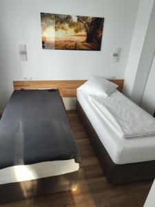 Postel nebo postele na pokoji v ubytování Outlet-Apartment Metzingen