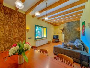 a living room with a table and a couch at Holiday Home in Palamós near the Beach in Palamós
