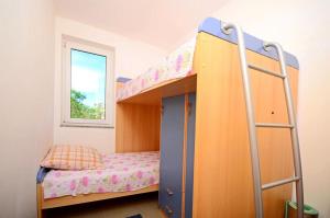 Ένα ή περισσότερα κρεβάτια σε δωμάτιο στο Apartment Darko 1
