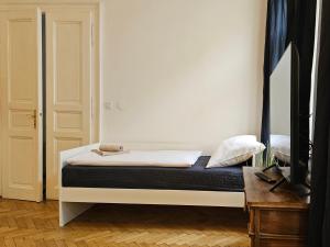 Postel nebo postele na pokoji v ubytování Slezska Apartments