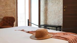 Posteľ alebo postele v izbe v ubytovaní Uria Rooms & Suite B&B