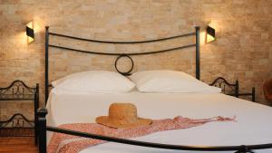 Posteľ alebo postele v izbe v ubytovaní Uria Rooms & Suite B&B