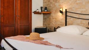 Posteľ alebo postele v izbe v ubytovaní Uria Rooms & Suite B&B