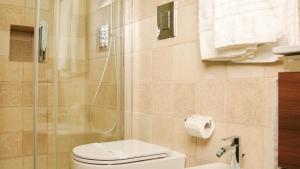 Kúpeľňa v ubytovaní Uria Rooms & Suite B&B