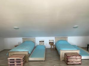 a room with two beds and some boxes at Villa hygge in Šibenik +26 photos