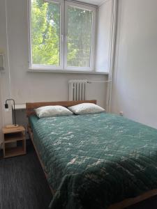 Posteľ alebo postele v izbe v ubytovaní Room in Old Town Krakow