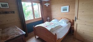 Postel nebo postele na pokoji v ubytování Le Chalet des Fées + 37 fotografií
