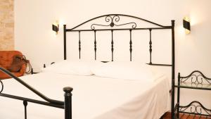 Posteľ alebo postele v izbe v ubytovaní Uria Rooms & Suite B&B