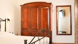 Posteľ alebo postele v izbe v ubytovaní Uria Rooms & Suite B&B