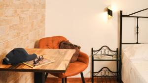 Posteľ alebo postele v izbe v ubytovaní Uria Rooms & Suite B&B