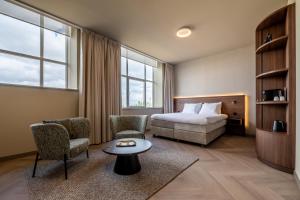 Postel nebo postele na pokoji v ubytování Hotel De Zeevaartschool + 37 fotografií