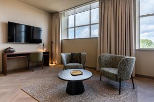 TV a/nebo společenská místnost v ubytování Hotel De Zeevaartschool