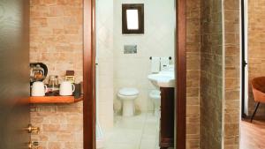 Kúpeľňa v ubytovaní Uria Rooms & Suite B&B