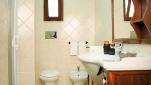 Kúpeľňa v ubytovaní Uria Rooms & Suite B&B