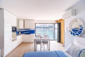 Postel nebo postele na pokoji v ubytování Apartments Palada 1