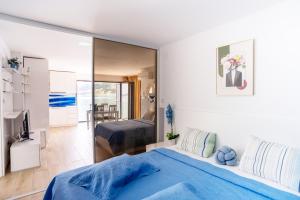 Postel nebo postele na pokoji v ubytování Apartments Palada 1