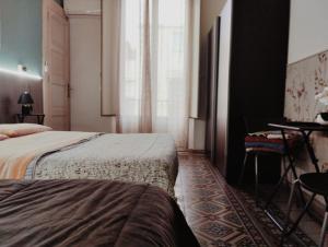 A bed or beds in a room at Al Duomo