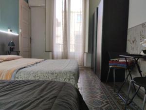 A bed or beds in a room at Al Duomo