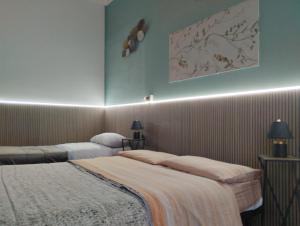 A bed or beds in a room at Al Duomo