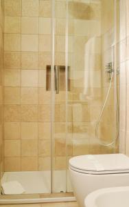 Kúpeľňa v ubytovaní Uria Rooms & Suite B&B