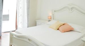 Posteľ alebo postele v izbe v ubytovaní Uria Rooms & Suite B&B