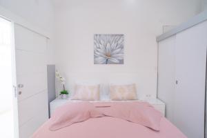 Postel nebo postele na pokoji v ubytování Apartments Palada 1