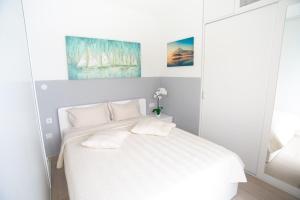 Postel nebo postele na pokoji v ubytování Apartments Palada 1