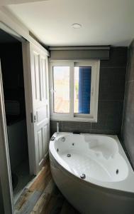 A bathroom at Camara Suite
