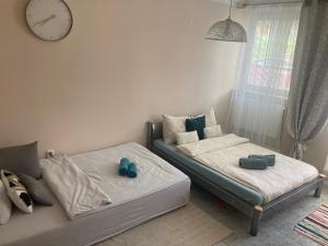Postel nebo postele na pokoji v ubytování Apartmán u Hradu
