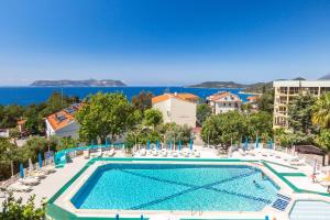 an image of a swimming pool at a resort at Hotel Club Phellos in Kaş