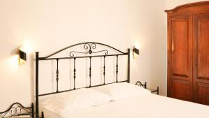 Posteľ alebo postele v izbe v ubytovaní Uria Rooms & Suite B&B