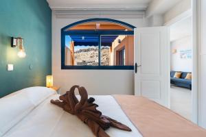 Ένα ή περισσότερα κρεβάτια σε δωμάτιο στο Home2Book Stunning Views Taurito, Terrace & Pool +22 φωτογραφίες