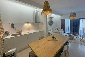 Posezení v ubytování Luxury 8P town house in center lEscala 50m beach