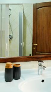 Kúpeľňa v ubytovaní Uria Rooms & Suite B&B