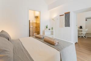 Letto o letti in una camera di B&Vibes Monopoli