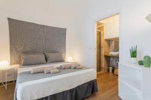 Letto o letti in una camera di B&Vibes Monopoli