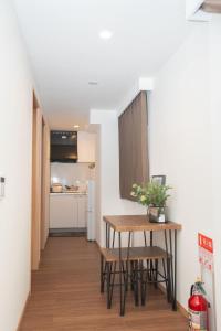 Η κουζίνα ή μικρή κουζίνα στο Natsumiホテル 高级独栋别墅301 +9 φωτογραφίες