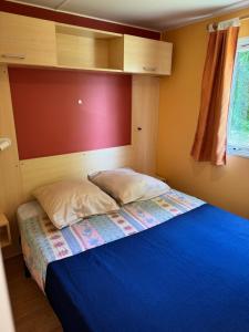 Postel nebo postele na pokoji v ubytování camping de la mottelette