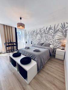 Postel nebo postele na pokoji v ubytování Appartement lumineux au cœur de la ville