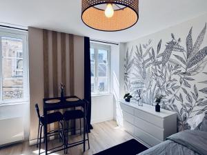 Posezení v ubytování Appartement lumineux au cœur de la ville