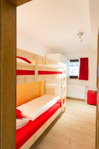 Postel nebo postele na pokoji v ubytování Haus Alpenblick Lofer