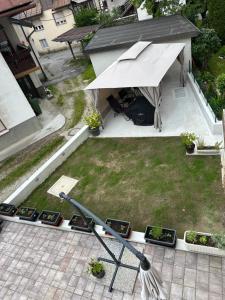 an overhead view of a garden with a tent and some plants at APARTMA ALMA in Bovec
