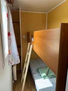 Postel nebo postele na pokoji v ubytování camping de la mottelette