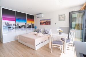 Postel nebo postele na pokoji v ubytování Apartments Palada 1
