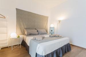 Letto o letti in una camera di B&Vibes Monopoli
