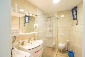 Koupelna v ubytování Apartments Palada 1