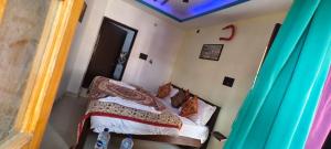 A bed or beds in a room at Heart and Soul of Jaisalmer
