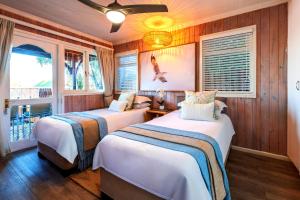 Postel nebo postele na pokoji v ubytování 4 TIDES Knysna River Club by First Private Stays + 68 fotografií